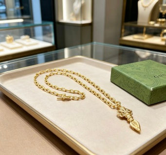 Gucci GG Engraved Spike Drop Gold Pendant Necklace