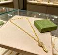 Gucci GG Engraved Spike Drop Gold Pendant Necklace