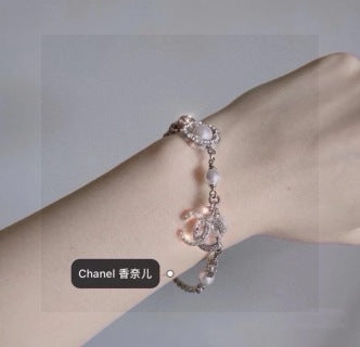 CHANEL Star and Pearl Camellia Bracelet