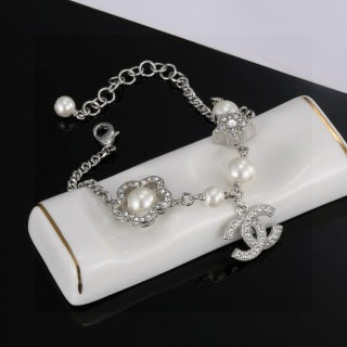 CHANEL Star and Pearl Camellia Bracelet