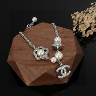 CHANEL Star and Pearl Camellia Bracelet