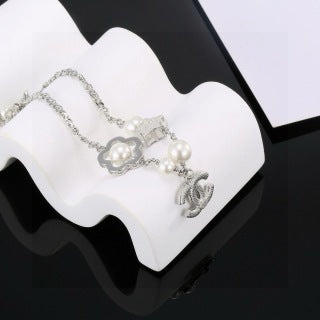 CHANEL Star and Pearl Camellia Bracelet