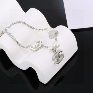 CHANEL Star and Pearl Camellia Bracelet