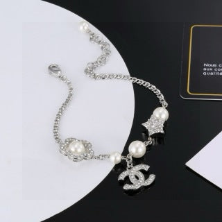CHANEL Star and Pearl Camellia Bracelet