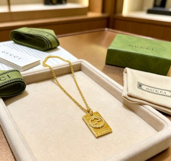 Gucci Vintage Crest Gold Plaque Pendant Necklace