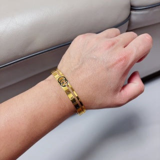 Gucci GG Engraved Slim Cuff Bangle Bracelet