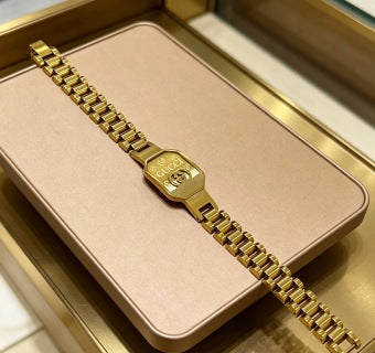 Gucci GG Engraved Buckle Gold Link Bracelet