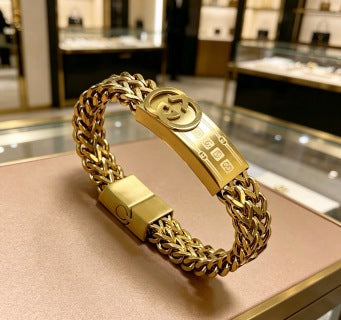 Gucci GG Engraved Plaque Chain Gold Bracelet