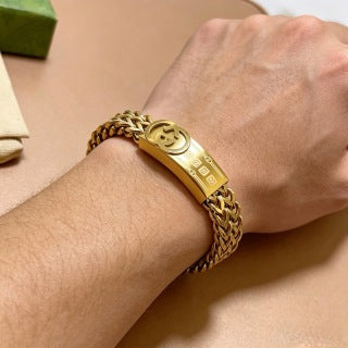 Gucci GG Engraved Plaque Chain Gold Bracelet
