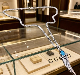 Gucci Blue Stone Winged Spike Pendant Silver Necklace