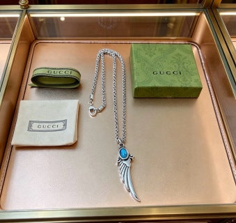 Gucci Blue Stone Winged Spike Pendant Silver Necklace
