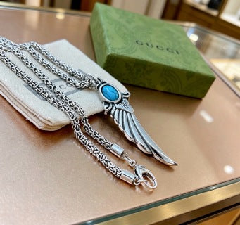 Gucci Blue Stone Winged Spike Pendant Silver Necklace