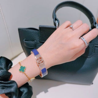 Gucci GG Enamel Purple Accent Gold Cuff Bracelet