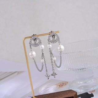 Louis Vuitton Pearl Star Chain Drop Earrings