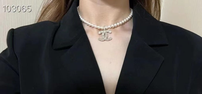 Chanel Elegant Pearl CC Pendant Necklace