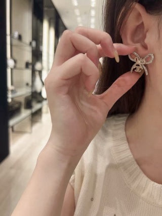 Chanel Elegant Bow CC Stud Earrings