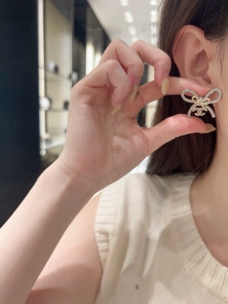 Chanel Elegant Bow CC Stud Earrings