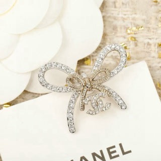 Chanel Elegant Bow CC Stud Earrings