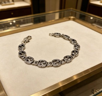 Gucci GG Interlocking Medallion Silver Link Bracelet