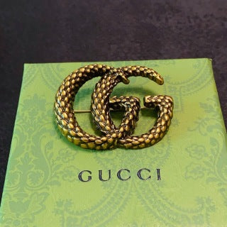Gucci GG Interlocking Textured Gold Brooch