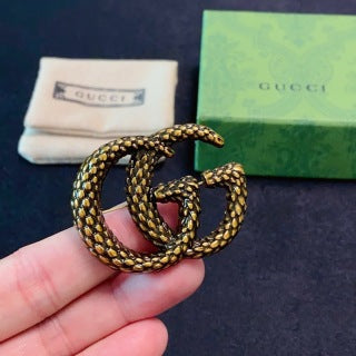Gucci GG Interlocking Textured Gold Brooch