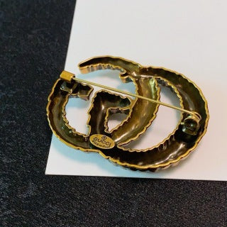 Gucci GG Interlocking Textured Gold Brooch