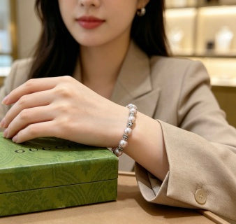 Gucci GG Pearl Bead Rose Gold Accent Bracelet