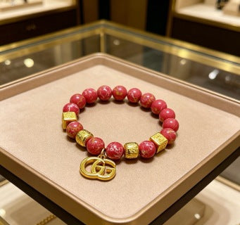 Gucci GG Red Bead Charm Gold Bracelet