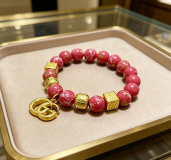 Gucci GG Red Bead Charm Gold Bracelet