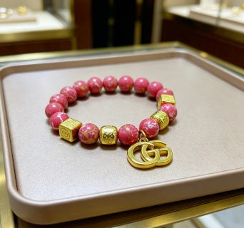 Gucci GG Red Bead Charm Gold Bracelet