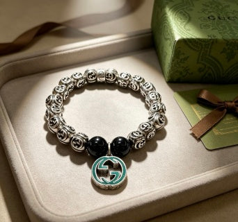 Gucci GG Black Bead Medallion Charm Bracelet