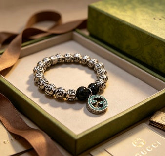 Gucci GG Black Bead Medallion Charm Bracelet