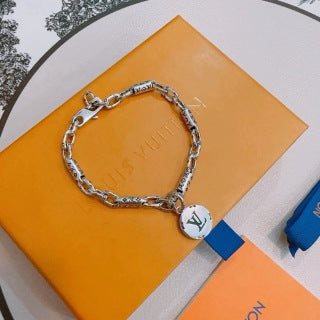 Louis Vuitton Engraved Link Medallion Bracelet