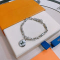 Louis Vuitton Engraved Link Medallion Bracelet