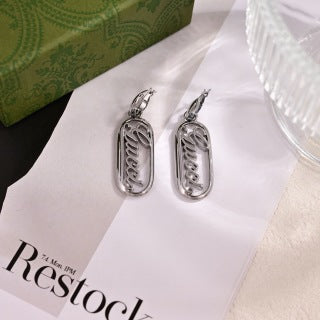 Gucci GG Engraved Oval Drop Silver Earrings