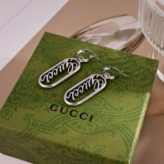 Gucci GG Engraved Oval Drop Silver Earrings