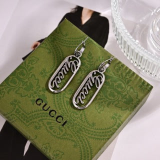 Gucci GG Engraved Oval Drop Silver Earrings