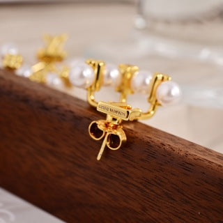 Louis Vuitton Pearl Blossom Star Stud Earrings