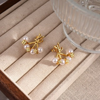 Louis Vuitton Pearl Blossom Star Stud Earrings