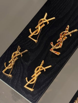YSL Cassandre Ruby Emblem Brooch