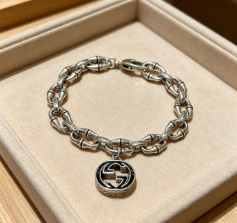Gucci GG Medallion Engraved Link Bracelet