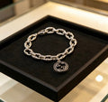 Gucci GG Medallion Engraved Link Bracelet