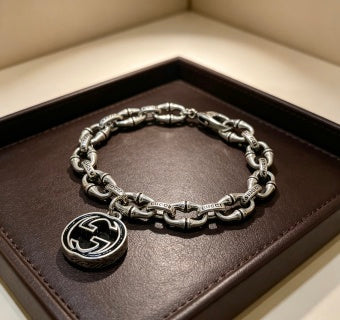 Gucci GG Medallion Engraved Link Bracelet