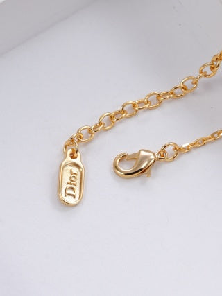 Dior Evelisse Ruby Link Charm Chain Bracelet