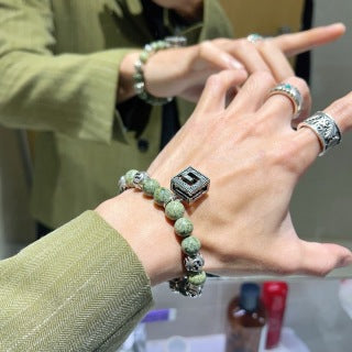 Gucci GG Engraved Stone Bead Charm Bracelet
