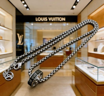 Louis Vuitton Monogram Orbit Barrel Pendant Necklace