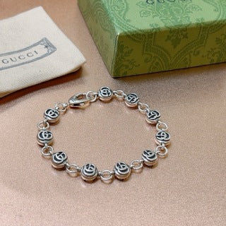 Gucci Interlocking GG Bead Charm Bracelet