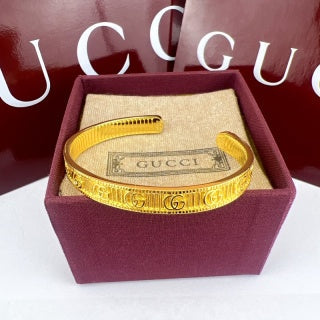 Gucci GG Engraved Open Cuff Gold & Silver Bracelet