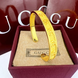 Gucci GG Engraved Open Cuff Gold & Silver Bracelet