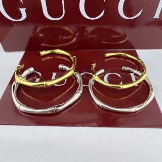 Gucci GG Interlocking Open Cuff Gold & Silver Bracelet